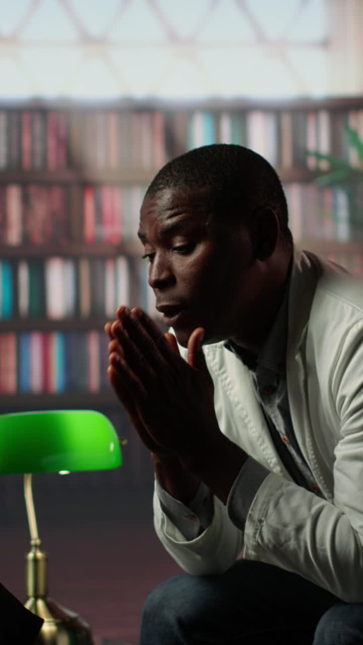 Distressed African American Man Covering Face and Gesturing