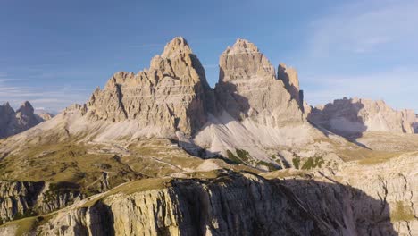 forward drone shot above mountains in tre cime nature park