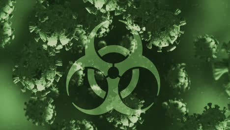 Biohazard-symbol-over-multiple-covid-19-cells-floating-against-green-background