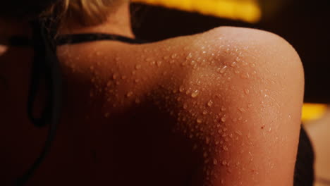 woman's wet shoulder