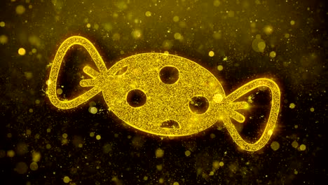 las partículas de brillo dorado del icono del caramelo.