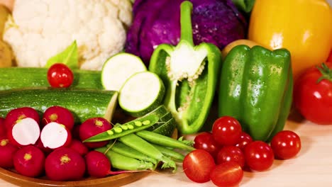 assorted vegetables arranged on a black background