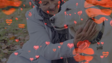 animation of heart icons floating and pet dog with senior caucasian woman