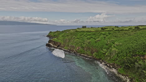 maui hawaii aerial v14 cinematic drone flyover honolua bay along the rugged coastline capturing picturesque landscape of lipoa point with lush vegetations - shot with mavic 3 cine - december 2022