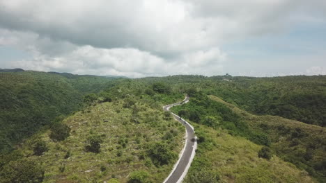 aerial view of motorcycles on ridge top road