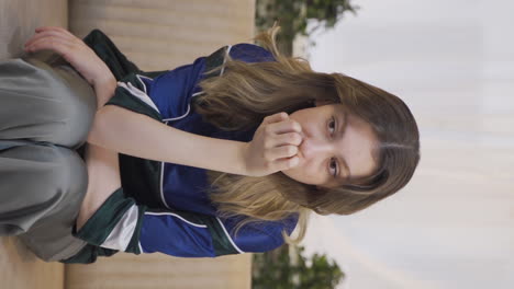 vertical video of nervous young woman stressed and thoughtful.