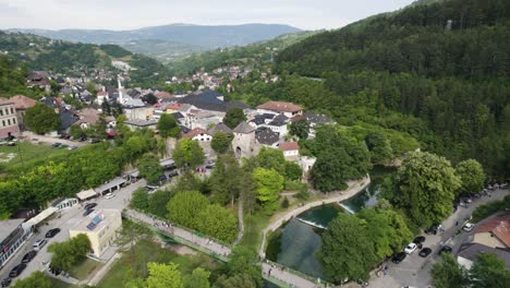 jajce riverside townscape, bosnia herzegovina. aerial flyover