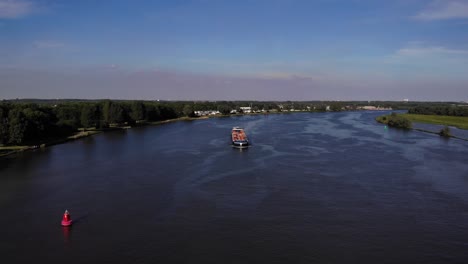 Distant-View-Of-Borelli-Cargo-Vessel-At-Oude-Maas-River-In-Barendrecht-Town-In-Netherlands
