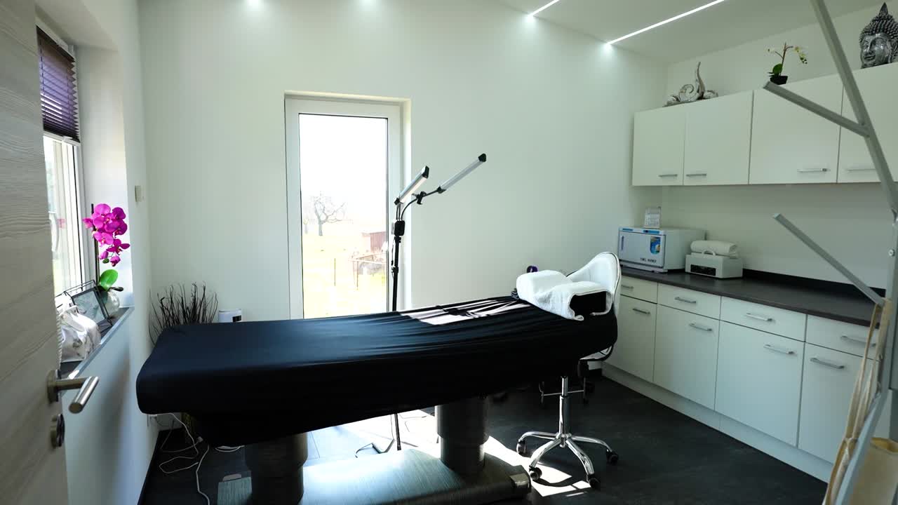 Bright and Modern Spa Treatment Room with Relaxing Ambiance for Skincare Services