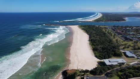 white sandy shore of lighthouse beach in new south wales, australia - aerial drone shot