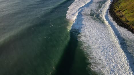 Aerial-over-large-surf-at-Burleigh-Heads,-Gold-Coast,-Australia