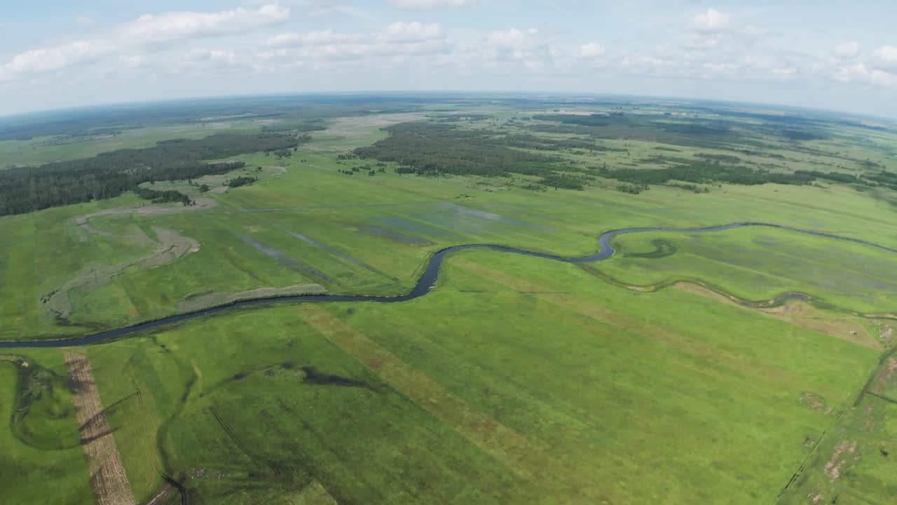 High altitude, aerial shot of the vast wetlands of Biebrza National Park in Eastern Poland