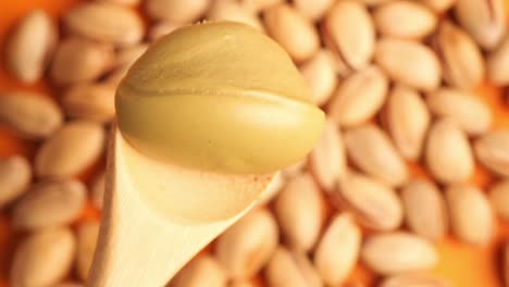 pistachio butter on a wooden spoon