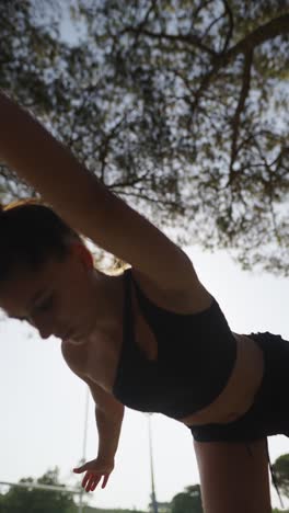 woman doing yoga pose outdoor