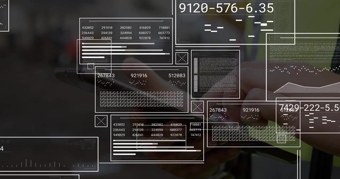 Technician holding tablet in industrial site, showing panels updating data as finger tapping panel