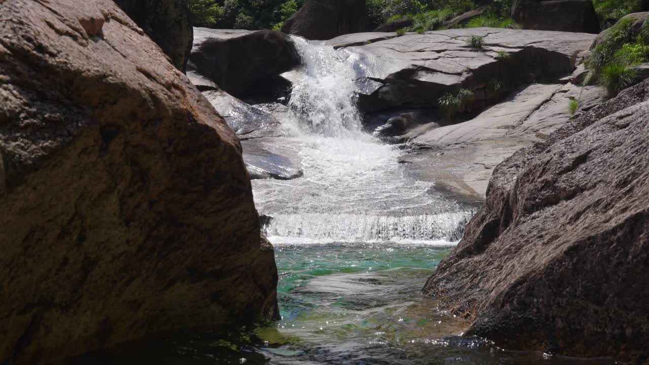 A clear stream in the valleyFlowing streams, clear and pure water resources