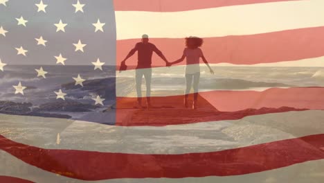 animation of flag of usa over african american couple at beach