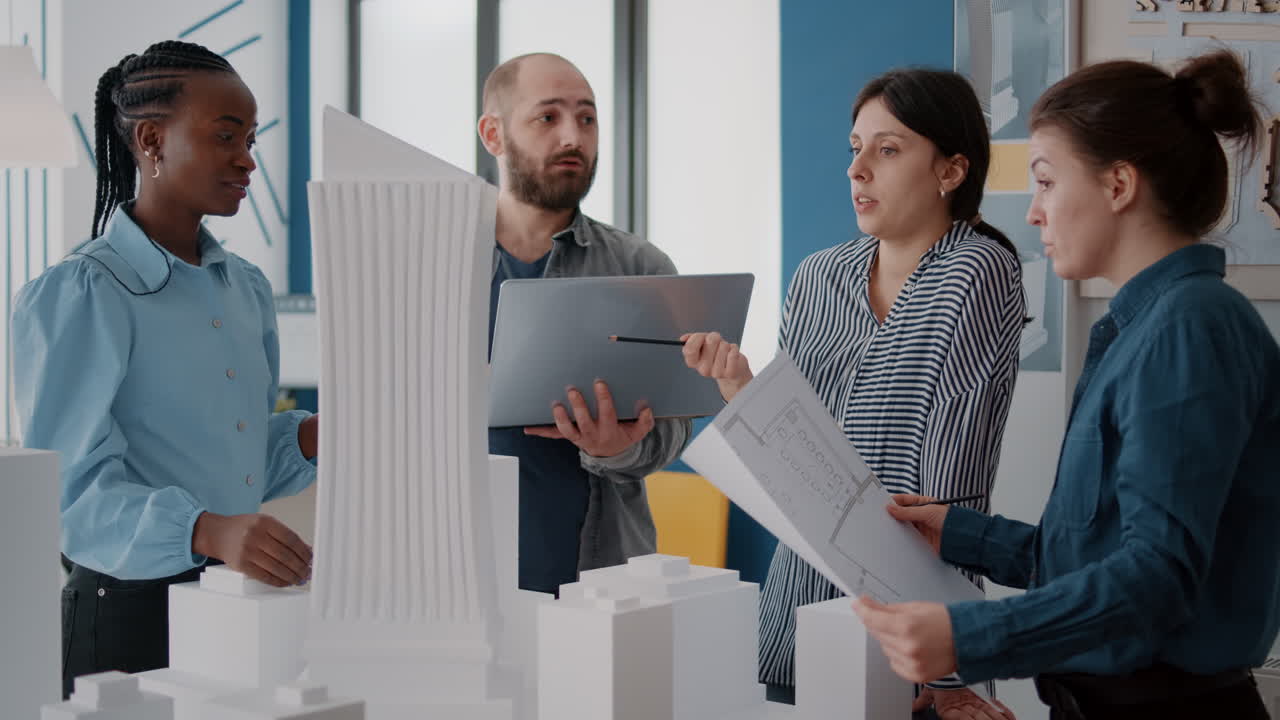 Team of architects collaborating on building design