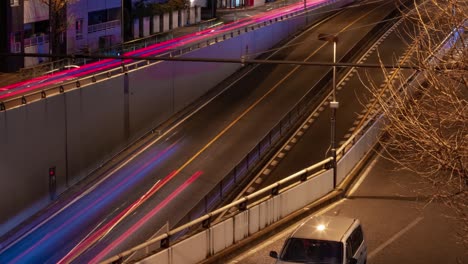 a night timelapse of the traffic jam at the city street in tokyo