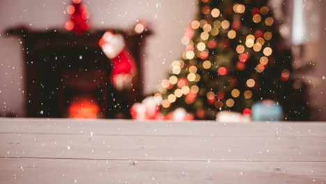 animación de la nieve cayendo sobre la habitación borrosa y la decoración de navidad