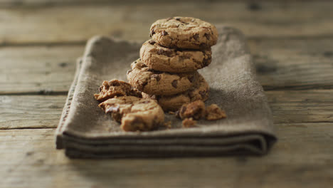 video of biscuits with chocolate on wooden background