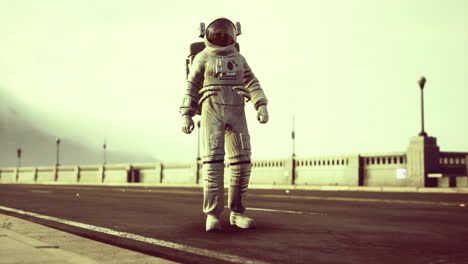 astronauta camina por un camino vacío en un paisaje surrealista durante el día