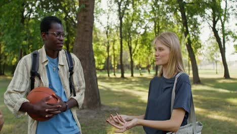 friends talking in a park