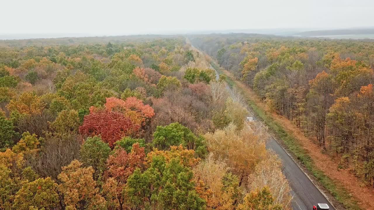 Aerial view road construction site machine. Aerial drone view on highway road under construction