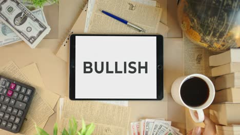 bullish displaying on finance tablet screen