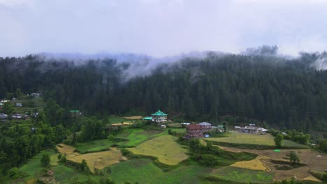 drone shot of a cloudy sainj valley in himachal pradesh near manali, kasol-10