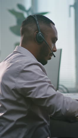 man working in a call center