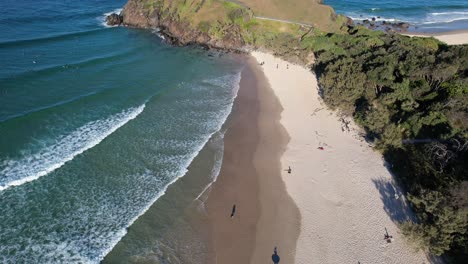 aerial view over cabarita beach and norries headland in new south wales, australia - drone shot