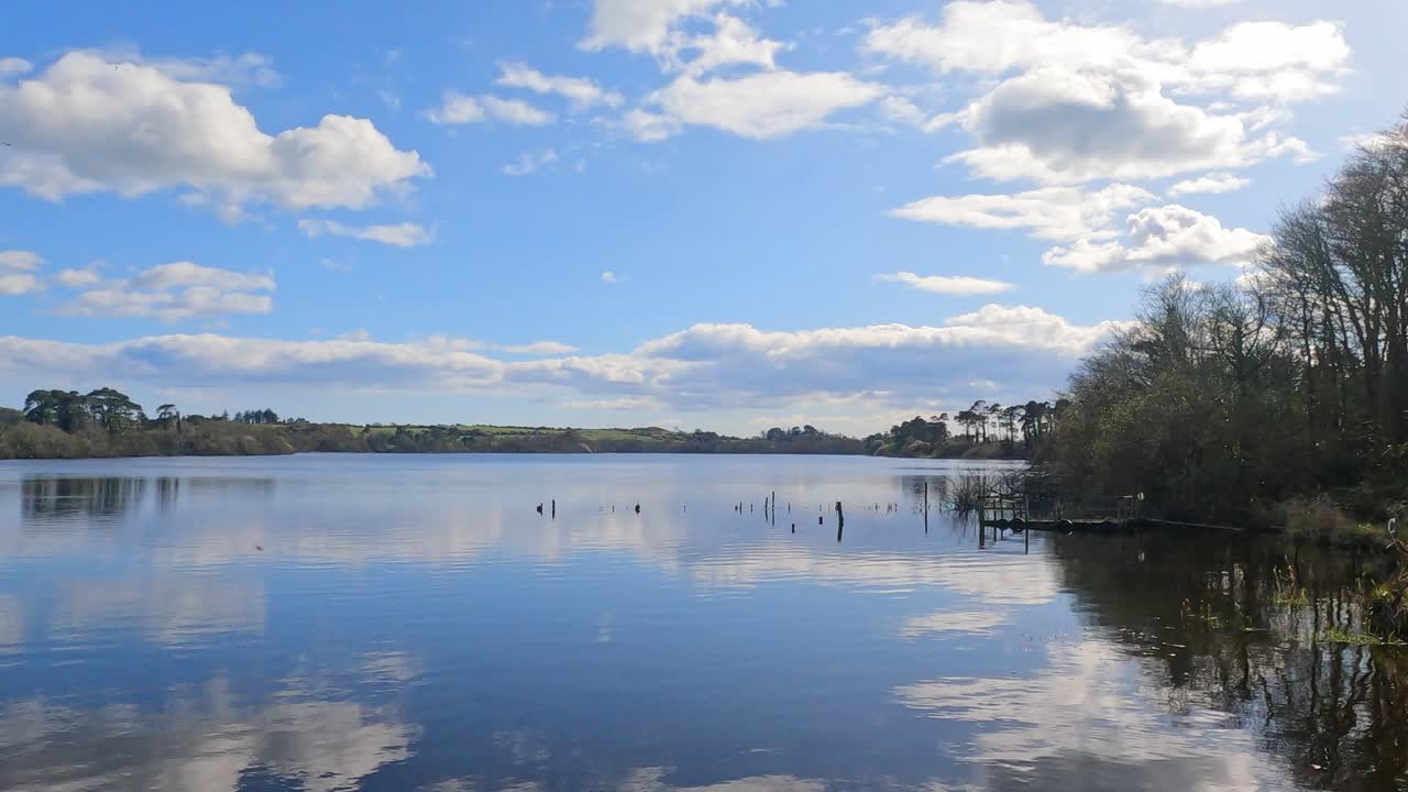 Calm lake in Waterford Ireland on an early spring day