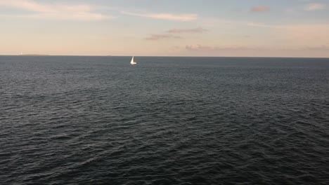location: punta del este, uruguay.summertimebeautiful day with calm waters and a boat saling far away.