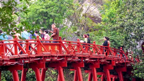 tourists enjoying a scenic bridge view