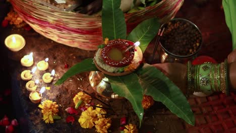 burning oil lamp with offerings during holy rituals at festival from different angle video is taken on the occasions of chhath festival which is used to celebrate in north india on oct 28 2022