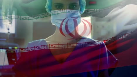 animation of flag of iran waving over anesthesiologist in operating theatre