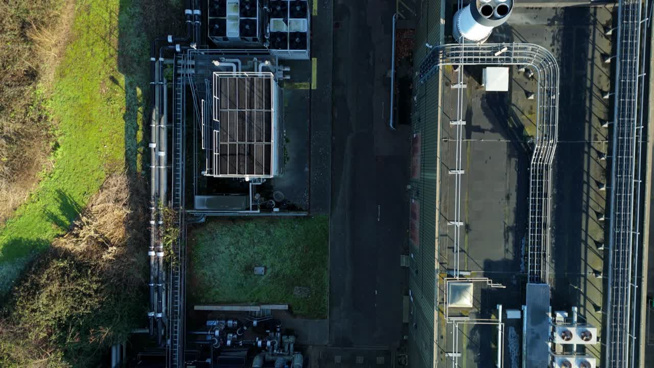 Low altitude drone shot approaching a large-scale internet data facility in Royal Leamington Spa