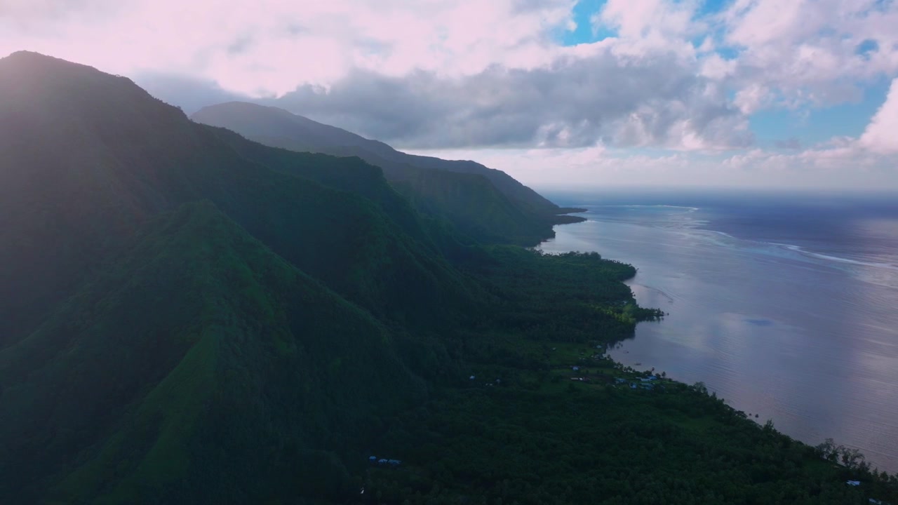 Tahiti Teahupo'o surf town coastline mountainside Volcano South Pacific island Ocean coral reef aerial drone French Polynesia island lagoon surfing Passe Havea harbor view landscape circle right
