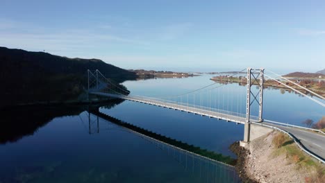 aerial view of the trongstraumen bridge spanning above the fjord