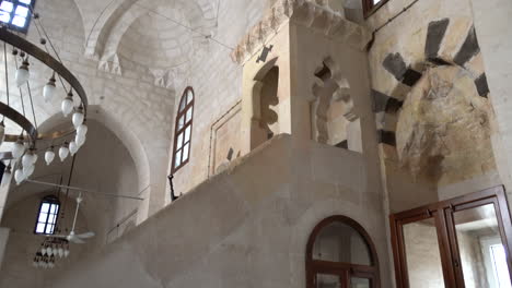 we see the pulpit of latifiye mosque in the old city of mardin, made of cut stone, from the bottom up