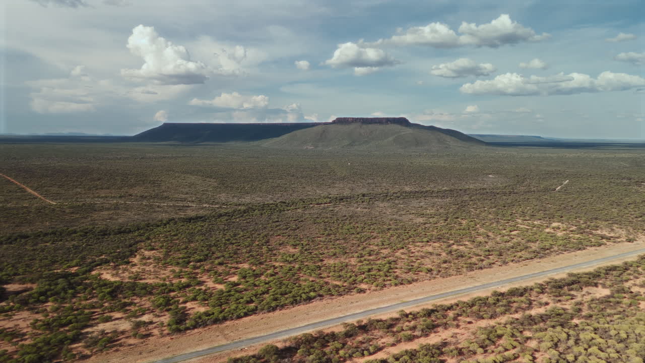 Aerial View of a Plateau and Road in a Savanna Landscape
