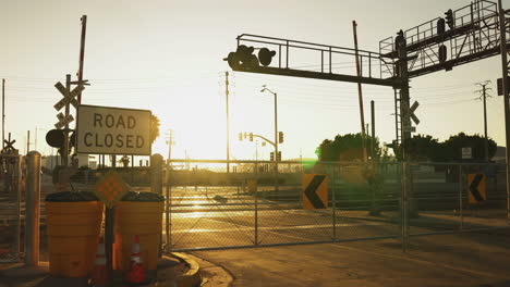 Evening-Sunset-In-Urban-Area-With-Golden-Sunshine-On-Closed-Road