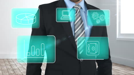 businessman using digital interface screen with icons