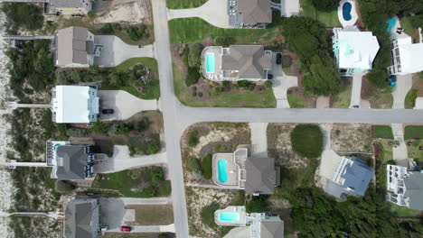 downward angle drone shot of beach homes