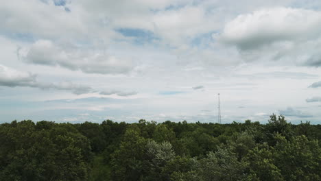 Densely-Forest-Trees-Against-Cloudscape-Sky-Near-Lamar,-Barton-County,-Missouri,-United-States