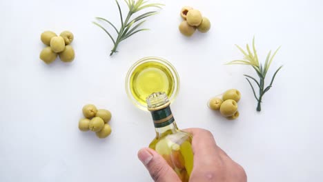 pouring olive oil