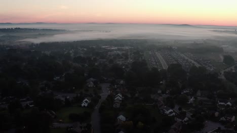 aerial flight over usa town at break of dawn
