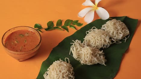 Breakfast-dish-with-rice-noodles-known-as-Idiyappam-or-Idiyappam-served-with-egg-roast