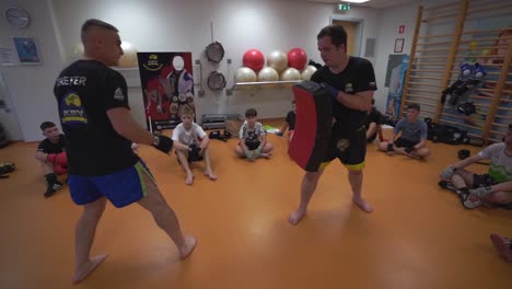 martial arts training class: kickboxing techniques